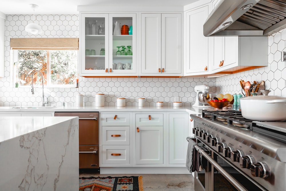 Modern kitchen workspace with stainless steel and bamboo tools
